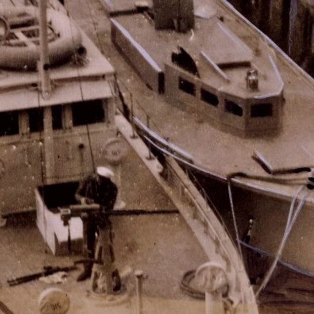 Captured rumrunner next to coast guard ship final 930x620