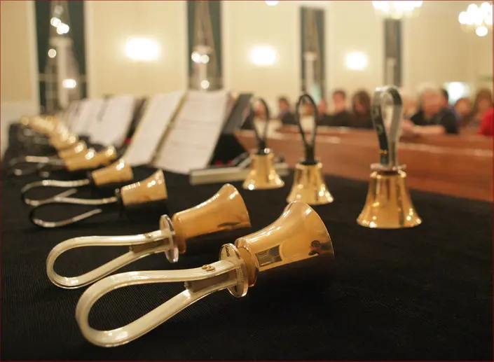 bells with congregation in background
